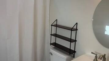 Shower, jetted tub, towels, soap