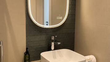 Shower, bidet, towels, soap