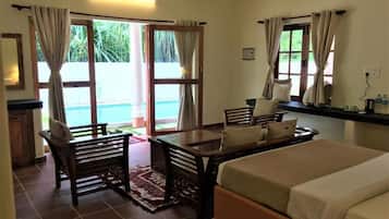 Deluxe Double Room, Balcony, Pool View | In-room safe, blackout curtains, soundproofing, free WiFi