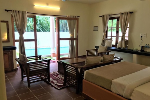 Deluxe Double Room, Balcony, Pool View | In-room safe, blackout drapes, soundproofing, WiFi (free)