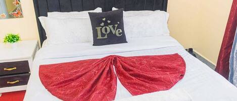 1 habitación, tabla de planchar con plancha, wifi gratis y ropa de cama