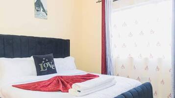 1 dormitorio, tabla de planchar con plancha, wifi gratis y ropa de cama