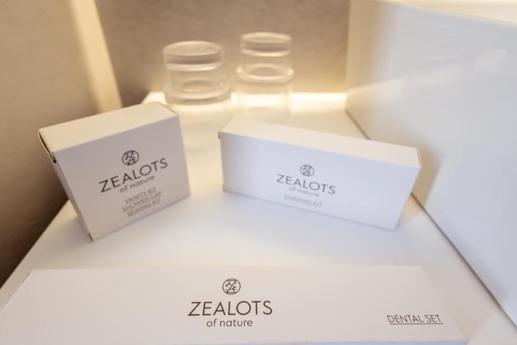 Three boxes labeled 'ZEALOTS of nature' with one specifically marked 'DENTAL SET'.