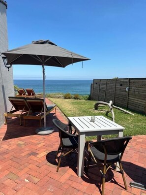 Family Room, Patio, Garden View | Outdoor dining - Mes Amis Beach Guesthouse (Wilderness)