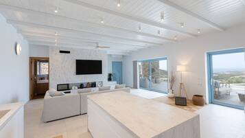 Villa, Beach View | Living area | 45-inch Smart TV with satellite channels