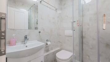 Shower, hair dryer, shampoo