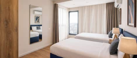 Apartment, 1 Bedroom | Iron/ironing board, WiFi (free), bed sheets