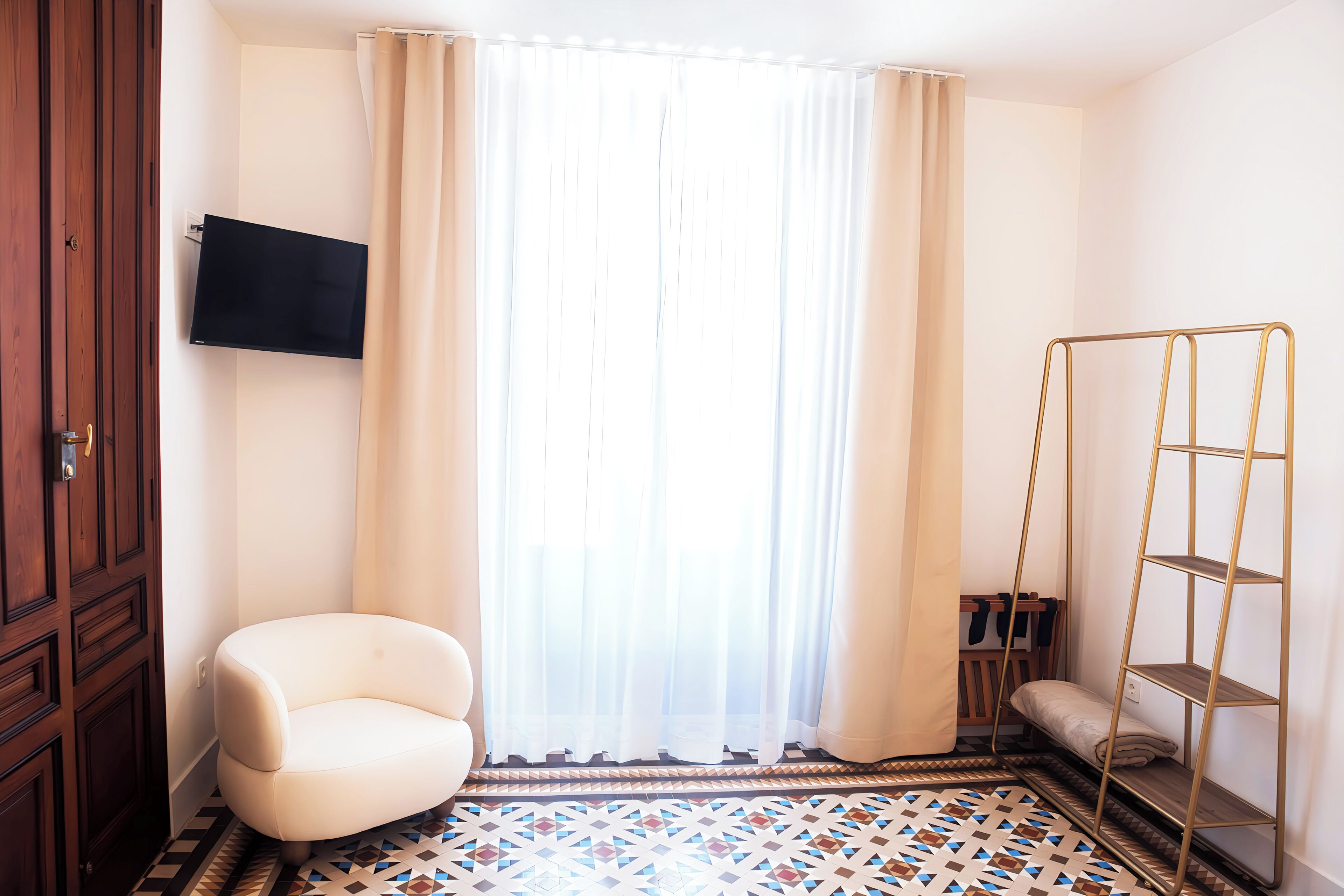 Premium Suite | Living area | 54-inch Smart TV with digital channels, heated floors