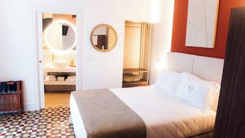 Deluxe suite, 1 queensize bed met slaapbank | Een laptopwerkplek, gratis wifi, beddengoed