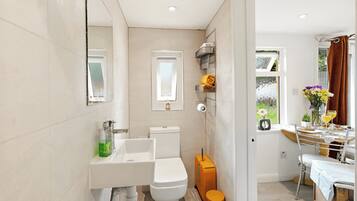 Shower, hair dryer, towels, soap