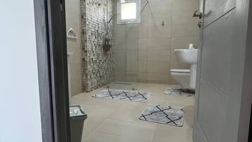 Shower, bidet, towels, soap