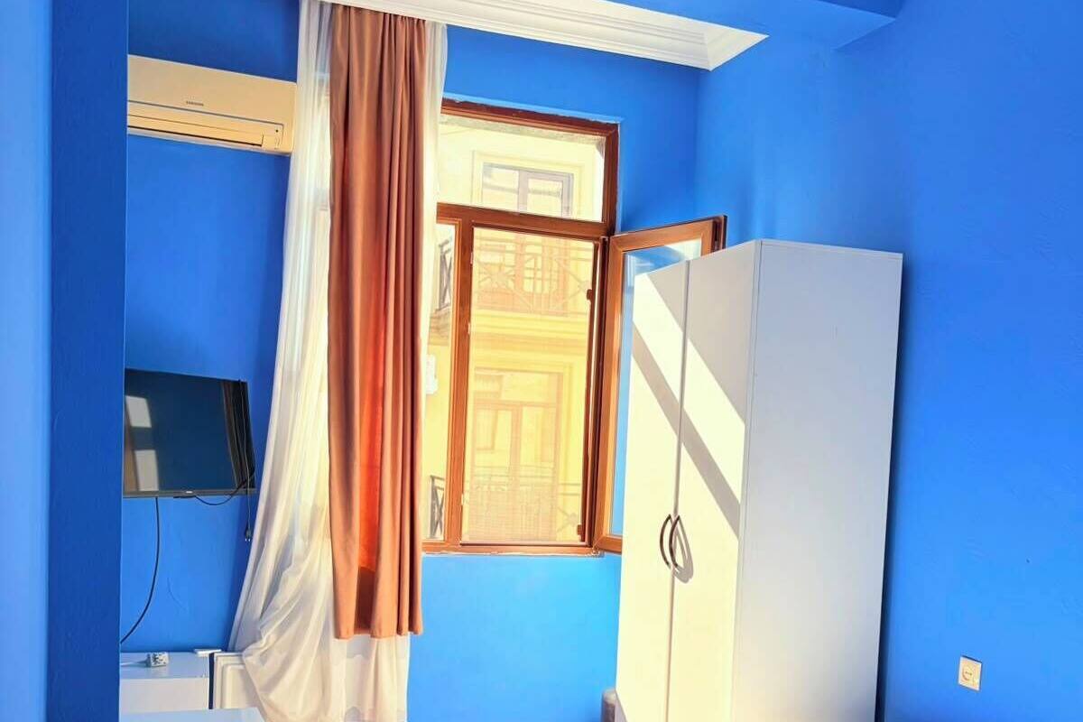 Comfort Single Room, Mountain View | In-room safe, desk, laptop workspace, blackout drapes