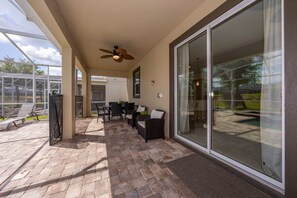 Outdoor dining - 6BR ChampionsGate Home · Pool · Near Disney (Davenport)