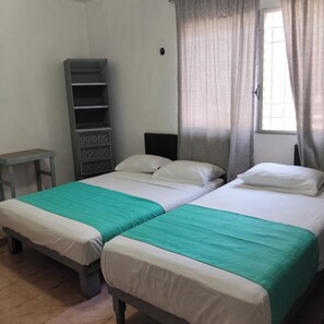 Family Triple Room, Multiple Beds | Iron/ironing board (on request), free WiFi - Room in Cancun Stadium (Cancun)