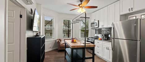Coffee/tea maker, fridge, microwave, oven