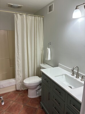 Hair dryer, towels, soap, toilet paper
