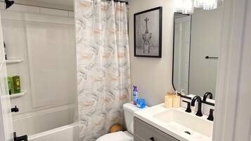 Hair dryer, towels, soap, shampoo