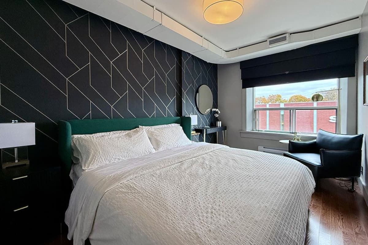 Premium bedding, memory foam beds, in-room safe, laptop workspace