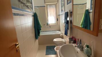 Hair dryer, towels, soap, shampoo