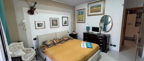 Desk, laptop workspace, iron/ironing board (on request), WiFi (free)