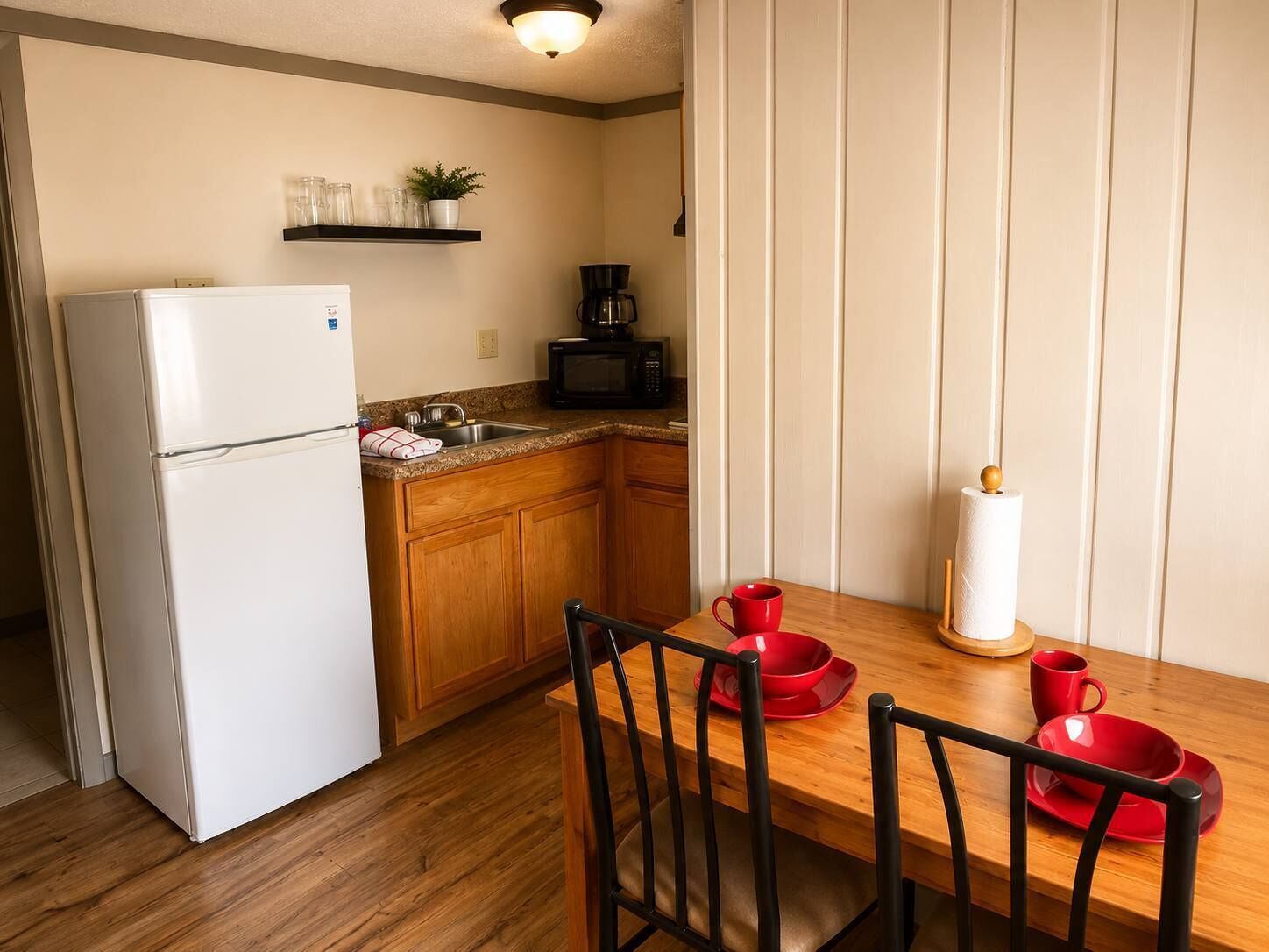 Fridge, microwave, coffee/tea maker, dining tables