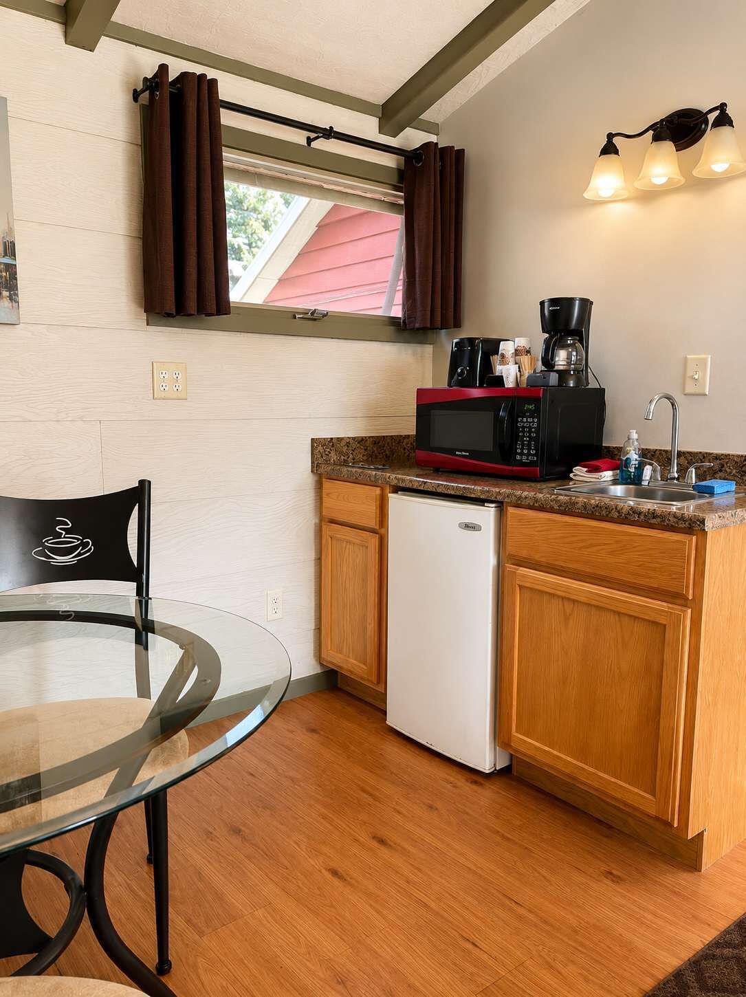 Fridge, microwave, coffee/tea maker, dining tables