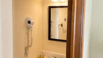 Shower, hair dryer, towels, shampoo