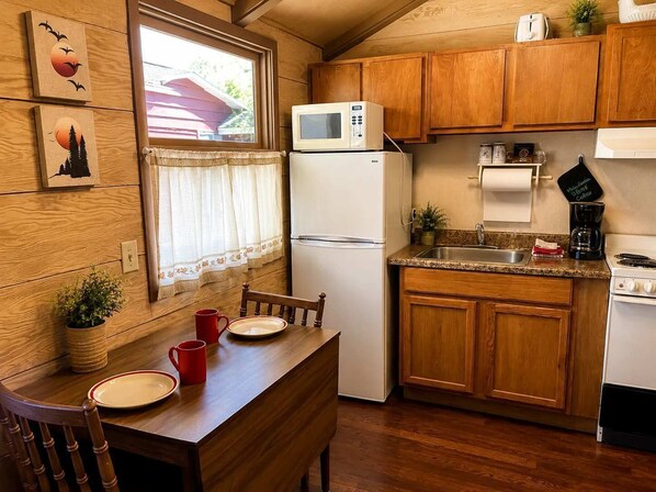 Fridge, microwave, coffee/tea maker, dining tables