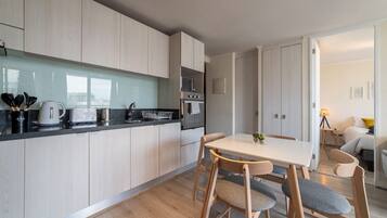 Family Apartment, Balcony, City View | Dining