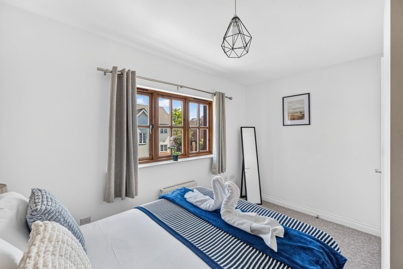 Bedroom four features a comfortable double bed with fresh linen and towels provided.