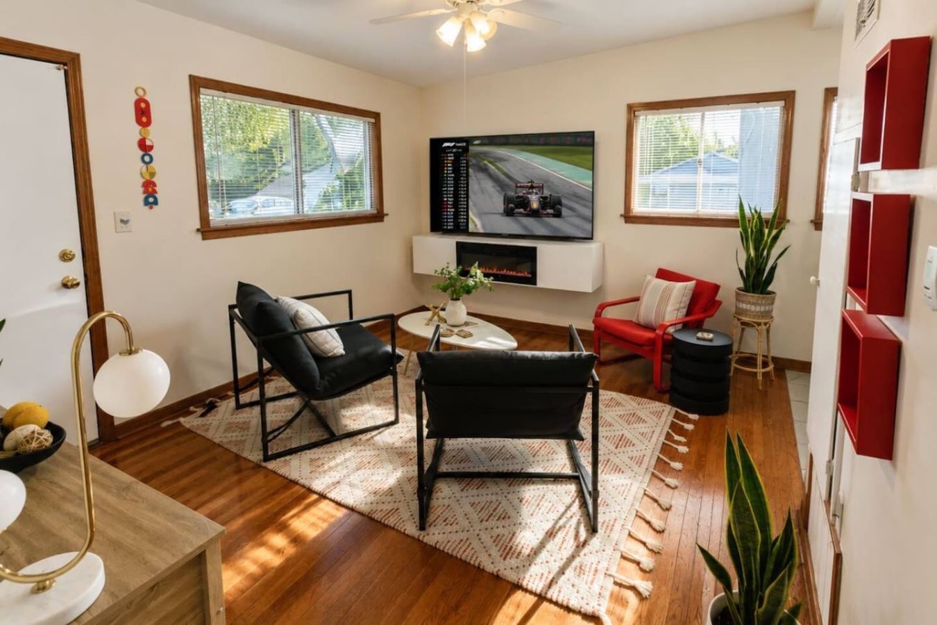 Living room with fireplace, TV, and seating