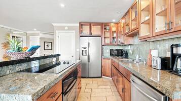 Coffee/tea maker, fridge, microwave, oven