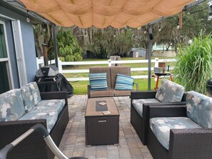 Terrace/patio - Charming 2-bedroom home near downtown Lake Placid, Lake June and DeVane Park. (Lake Placid)