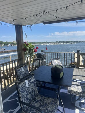 Outdoor dining - Peaceful 3-bedroom waterfront house with AC on charming Sodus Bay (Sodus Point)