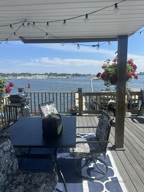 Outdoor dining - Peaceful 3-bedroom waterfront house with AC on charming Sodus Bay (Sodus Point)
