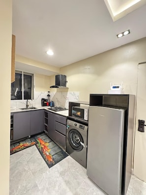 Appartamento Standard, balcone, vista città | Cucina privata