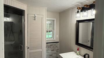 Shower, towels, toilet paper