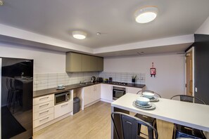 Standard-Einzelzimmer, Nichtraucher | Eigene Küche | Mini-Kühlschrank, Mikrowelle, Ofen, Herdplatte