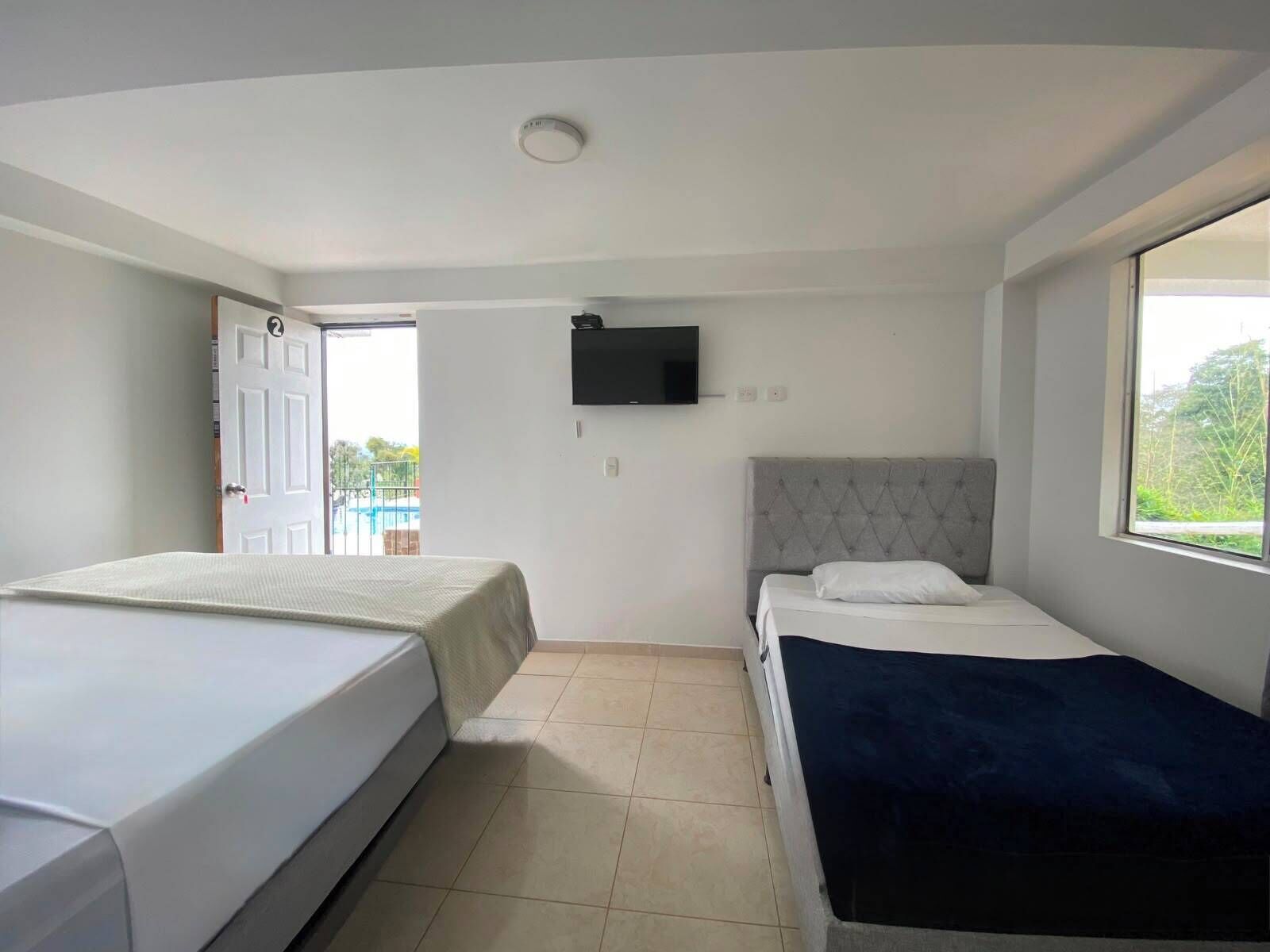 Basic Quadruple Room, Pool View | Free WiFi