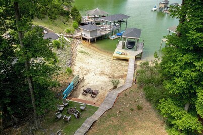 Lakeside Haven! SML Home with Private Boat Dock, Gym, Firepit and BEACH!