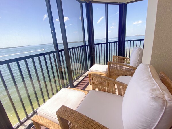Interior Lanai waterfront view - Sanibel Harbour 517: Luxury Water View! Experience gorgeous corner view! (Fort Myers)
