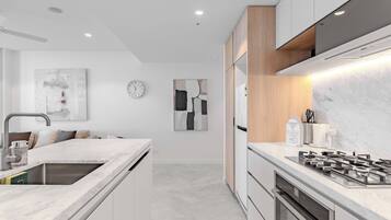 Coffee/tea maker, fridge, microwave, oven