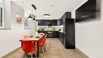 Coffee/tea maker, fridge, microwave, oven