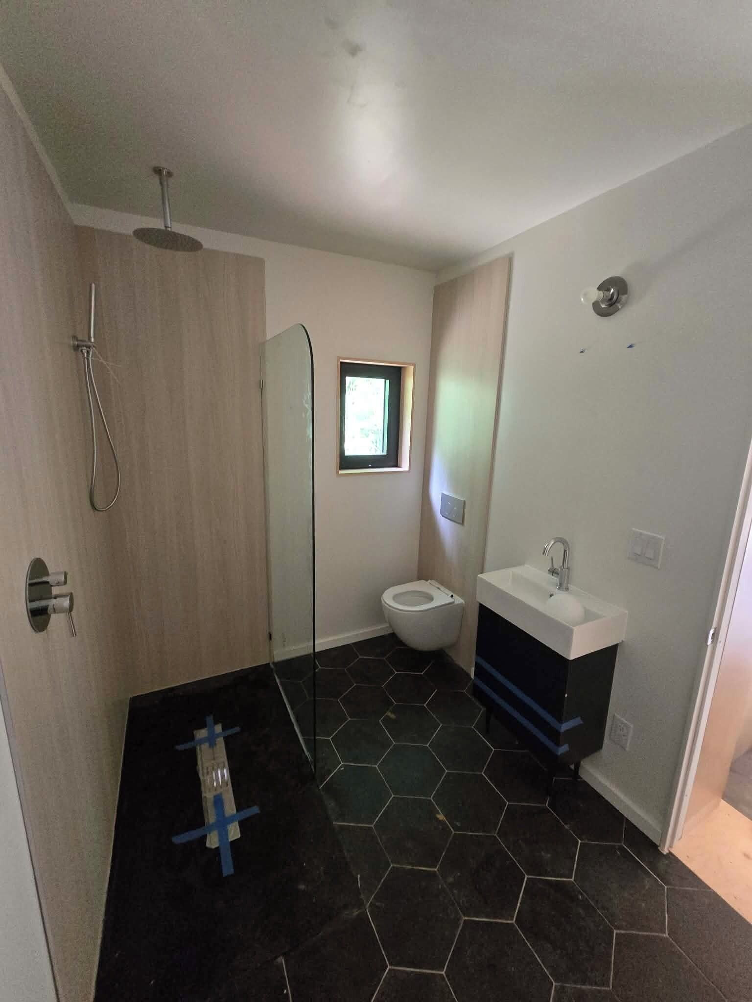 Shower, towels, soap, toilet paper