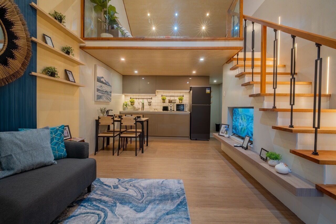 Villa Deluxe, vista al jardín | Área de sala de estar | Smart TV de 36 pulgadas con canales por cable 