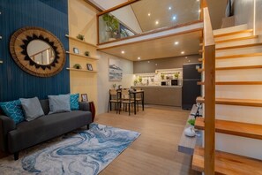 Villa Deluxe, vue jardin | Coin séjour