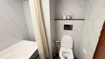 Deluxe Double Room, Balcony, City View | Bathroom | Separate tub and shower, free toiletries, hair dryer, towels