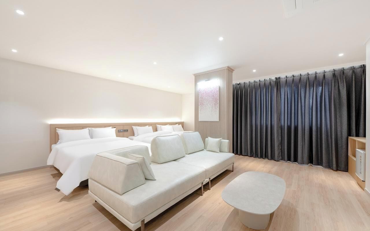 Family Room | Premium bedding, desk, laptop workspace, blackout drapes