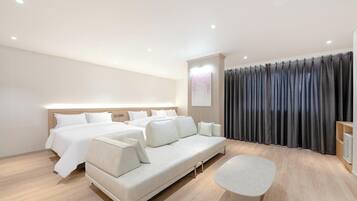 Family Room | Premium bedding, desk, laptop workspace, blackout drapes