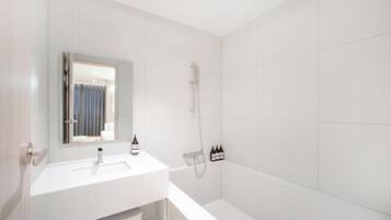Family Room | Bathroom | Shower, designer toiletries, hair dryer, bathrobes